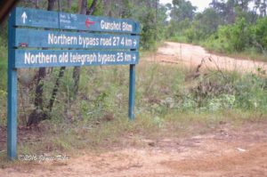 Another sign with directions to Gunshot Creek and two bypass roads.